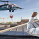 Illustration for article titled ‘Damn You’ Shouts Contact Tracer Losing Track Of Coronavirus After It Catches Hold Of Helicopter’s Ladder